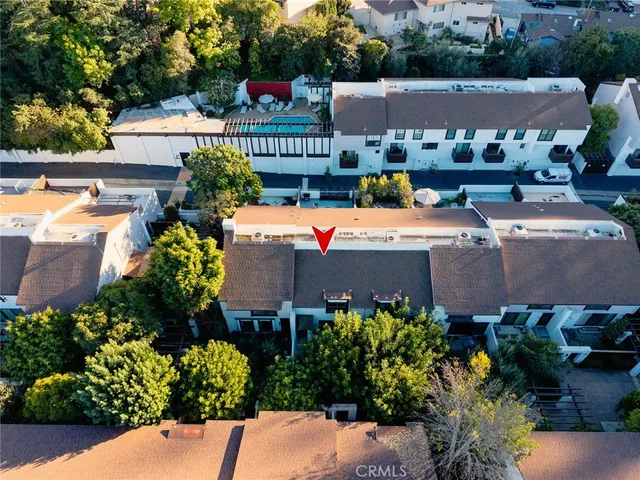 swimming pool view with a seating space