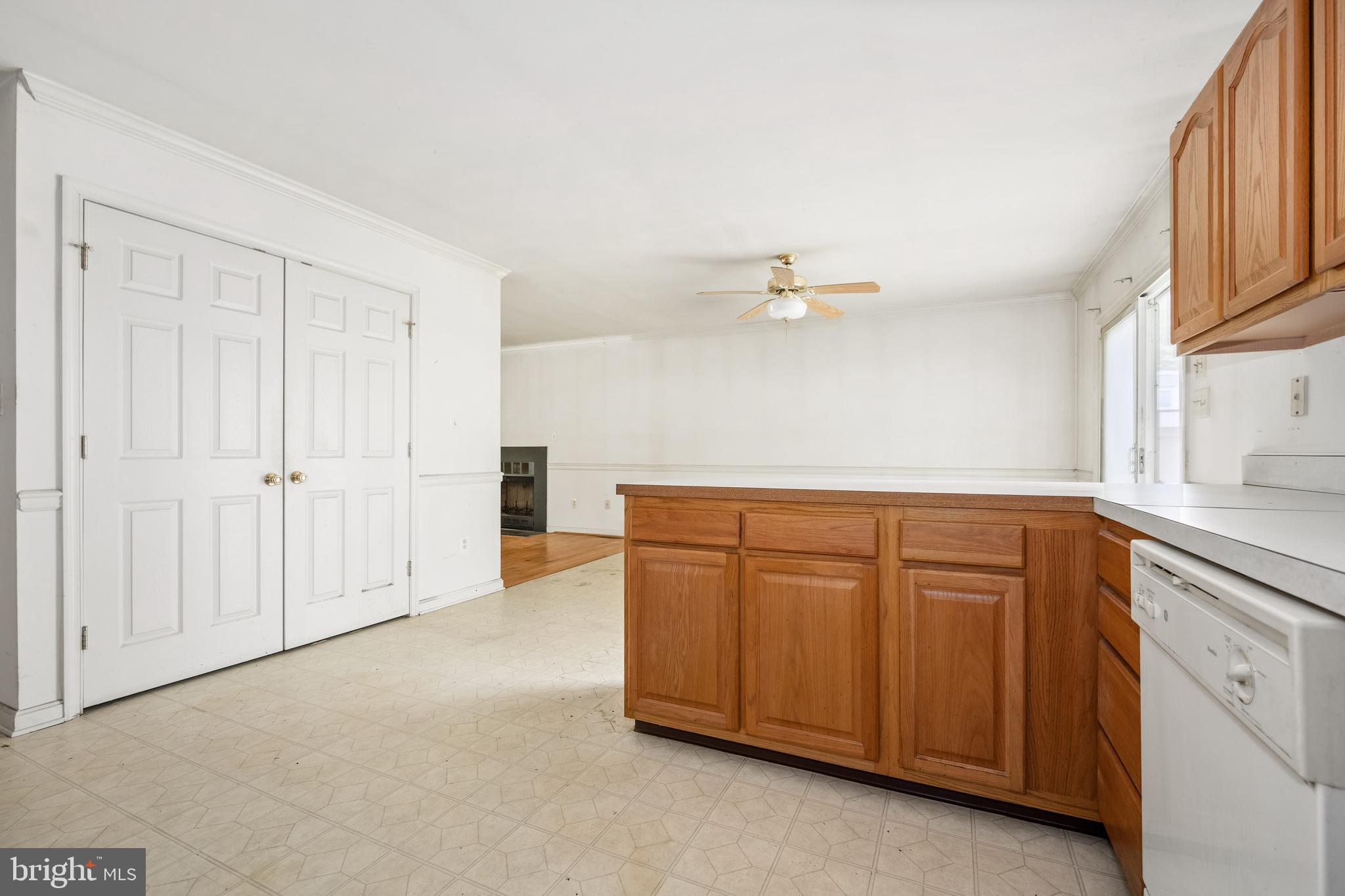 321 Lots Road Stevensville, MD 21666 - Photo 11 of 25 kitchen & closet for washer and dryer