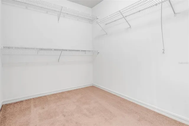 a view of a room with racks on the wall