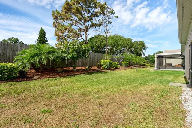 a view of a backyard with a garden