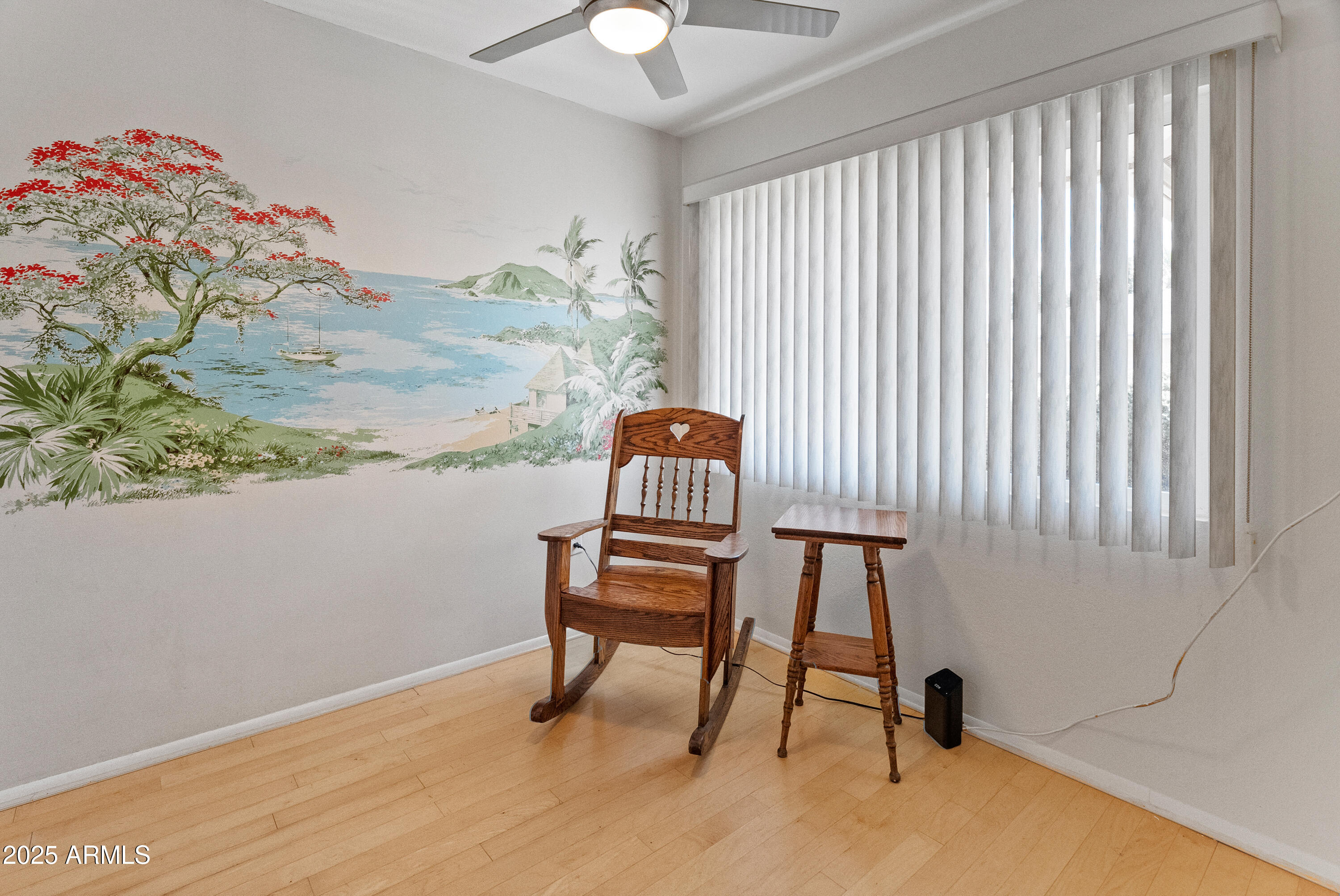10229 West Bolivar Drive Sun City, AZ 85351 - Photo 12 of 54 a view of a workspace with furniture and a window