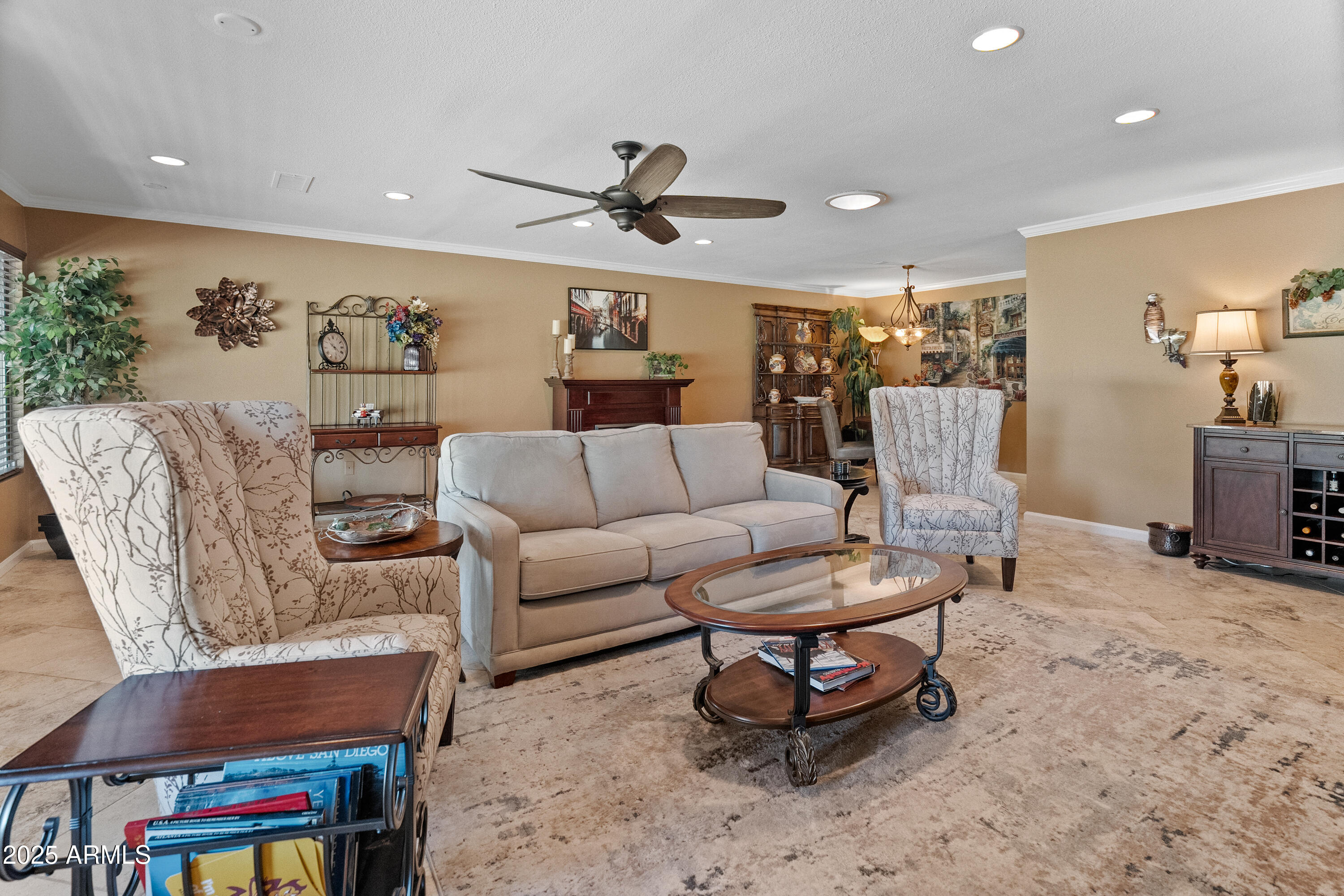 10229 West Bolivar Drive Sun City, AZ 85351 - Photo 16 of 54 a living room with furniture a rug and a table