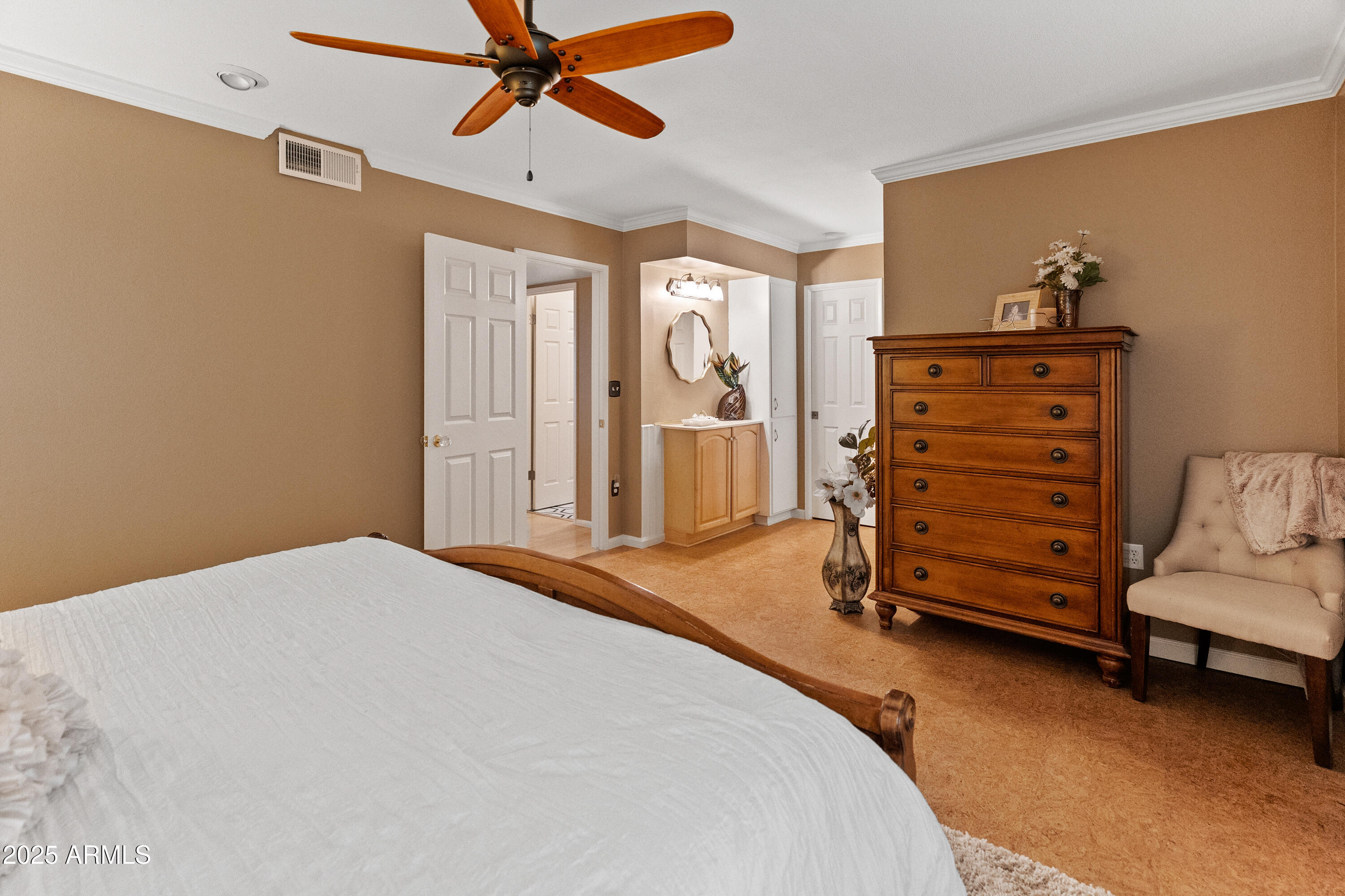 10229 West Bolivar Drive Sun City, AZ 85351 - Photo 20 of 54 a bedroom with a bed and furniture