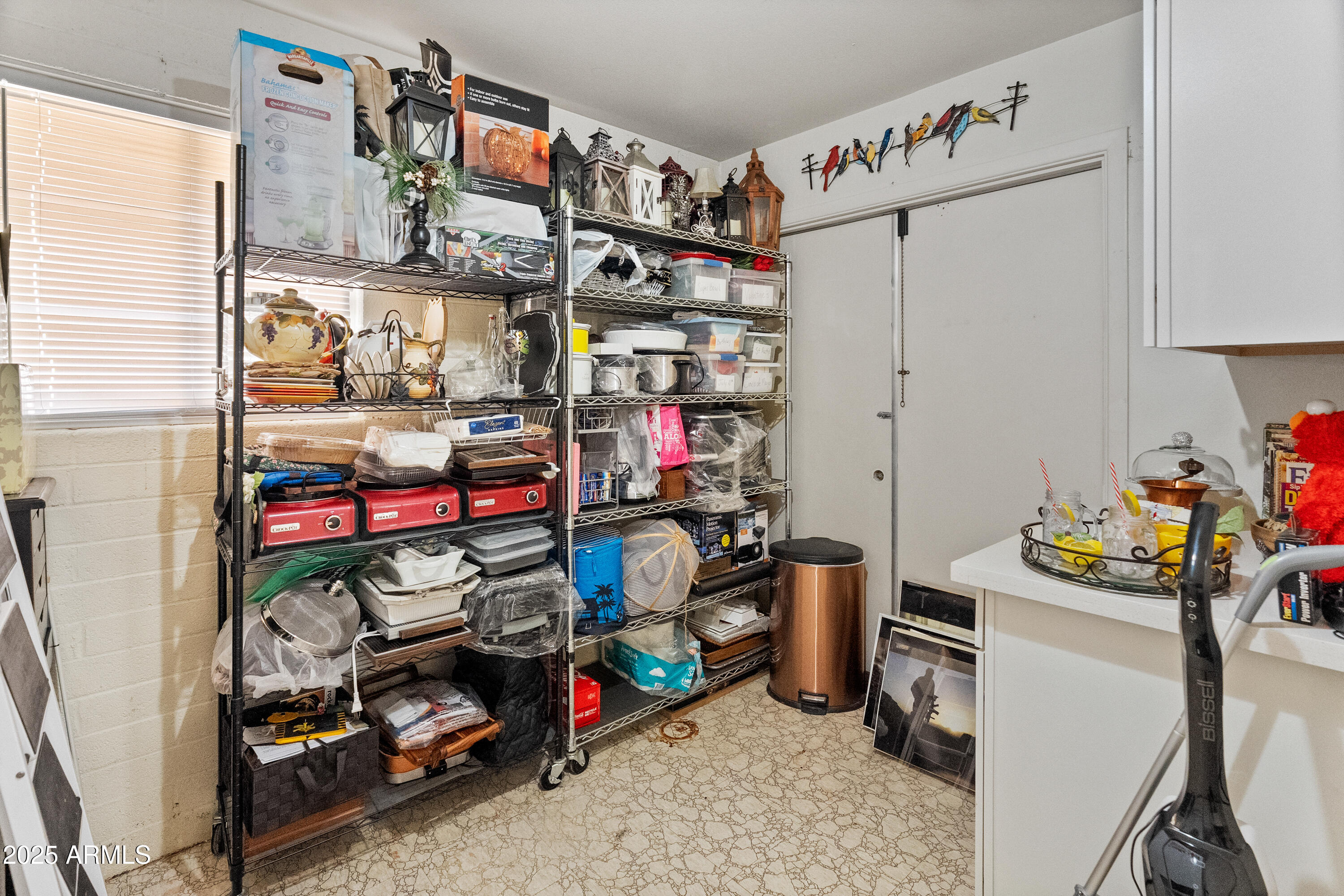 10229 West Bolivar Drive Sun City, AZ 85351 - Photo 29 of 54 a view of storage and utility room