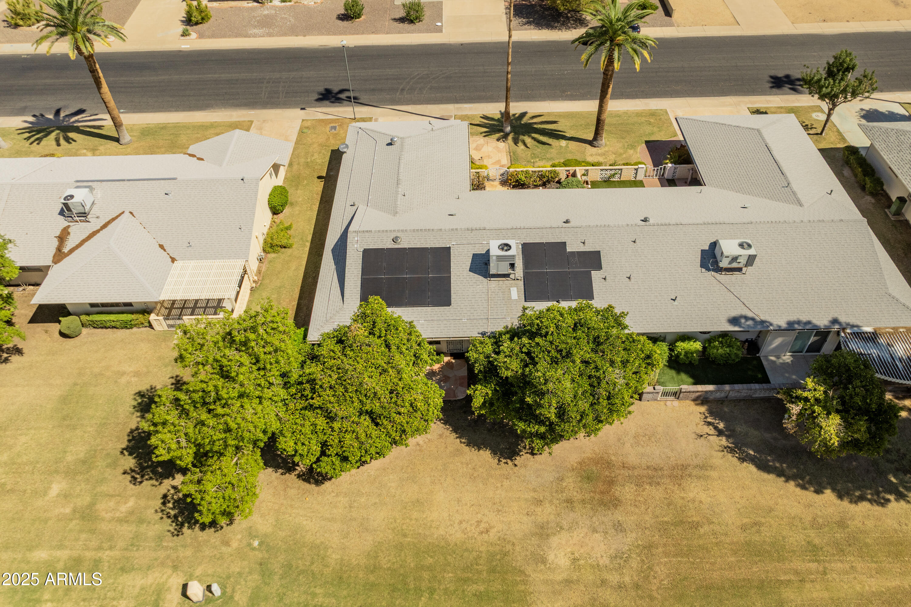 10229 West Bolivar Drive Sun City, AZ 85351 - Photo 41 of 54 a aerial view of a house with a yard