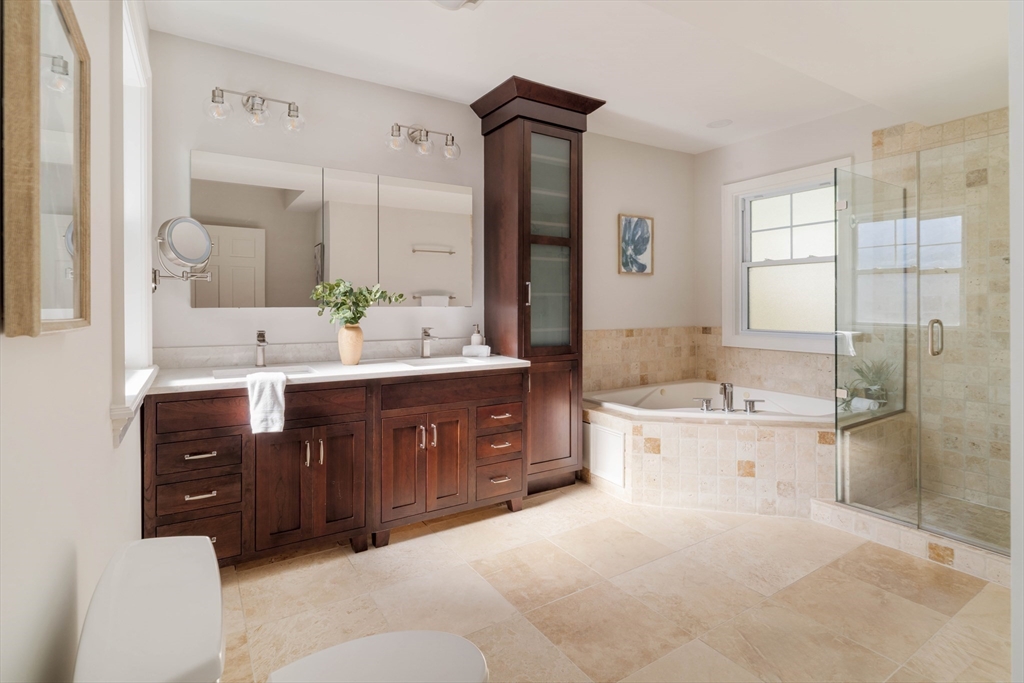 32 Hall Avenue, Unit 32 Somerville, MA 02144 - Photo 13 of 30 a spacious bathroom with a tub sink shower and mirror