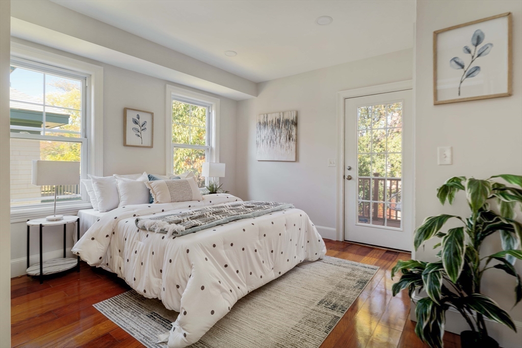 32 Hall Avenue, Unit 32 Somerville, MA 02144 - Photo 14 of 30 a bedroom with a bed and a window