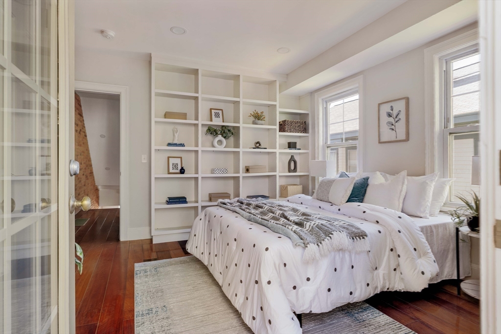 32 Hall Avenue, Unit 32 Somerville, MA 02144 - Photo 16 of 30 a bedroom with a bed and a window