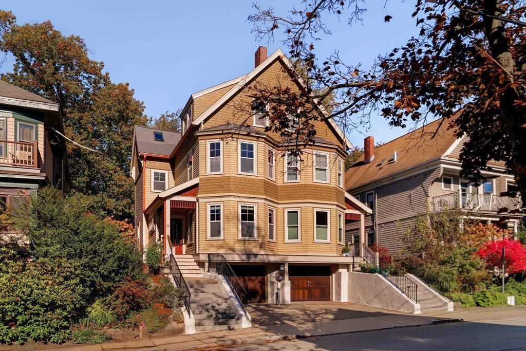32 Hall Avenue, Unit 32 Somerville, MA 02144 - Photo 29 of 30 a front view of a house with a yard