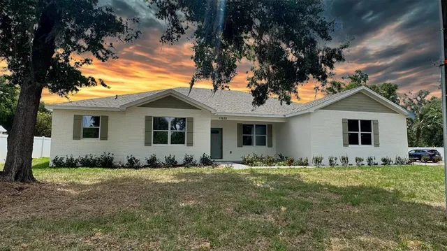 a front view of house with yard