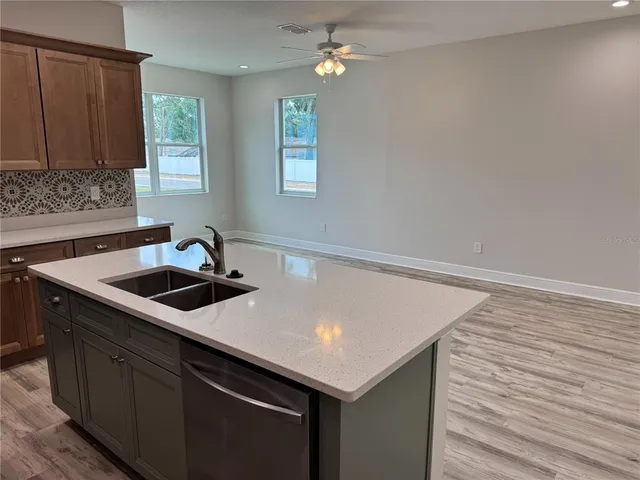 a room with a bed and a window