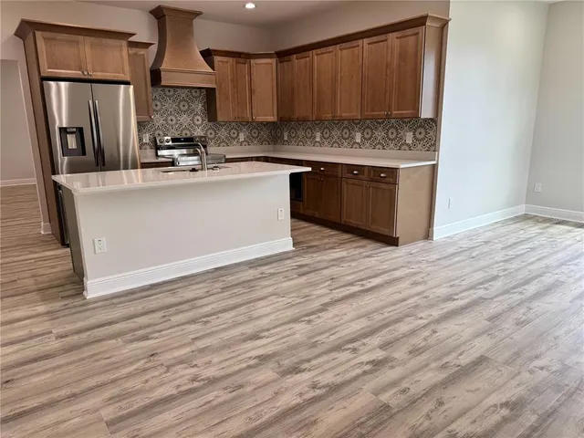 a bedroom with a bed and a table in it