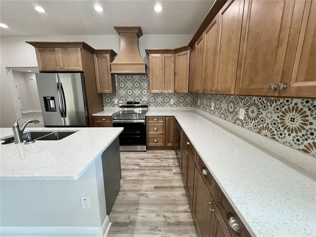 a bathroom with a toilet and a bathtub