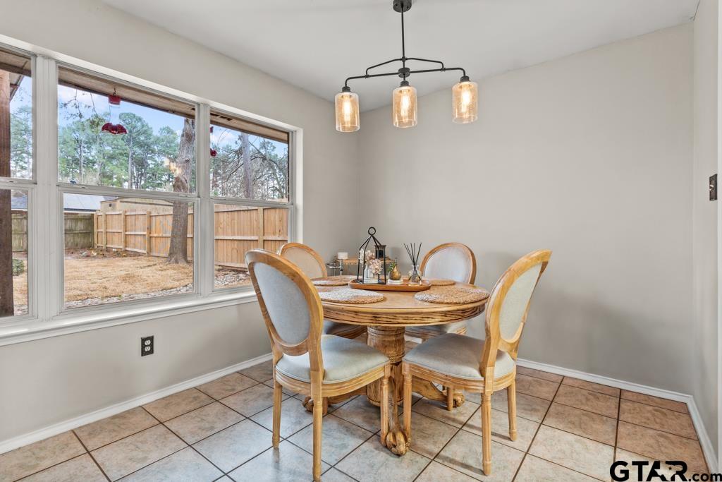 270 Frederick Circle Flint, TX 75762 - Photo 13 of 34 a view of a dining room with furniture wooden floor and a chandelier