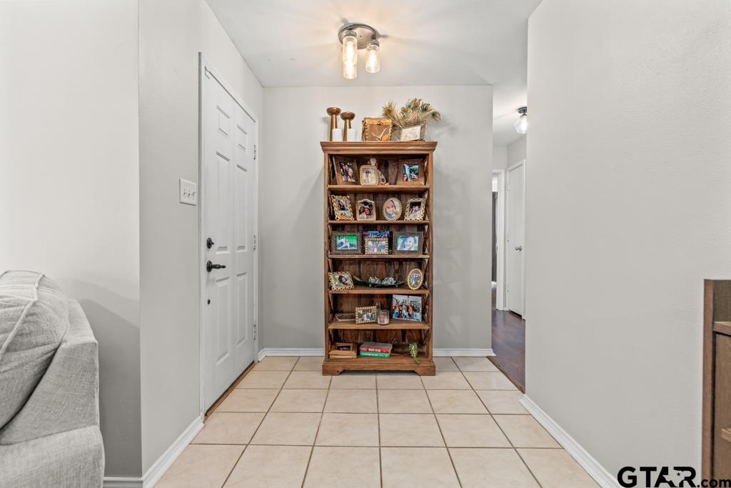 270 Frederick Circle Flint, TX 75762 - Photo 14 of 34 a view of a hallway to room with wooden floor