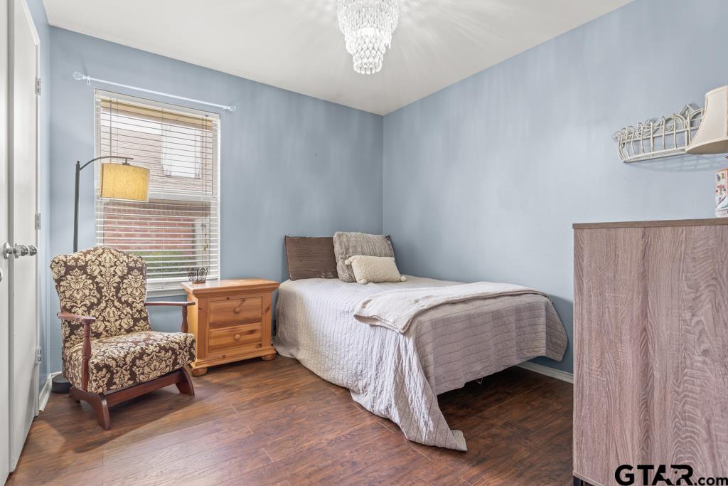 270 Frederick Circle Flint, TX 75762 - Photo 21 of 34 a bedroom with a bed and a couch
