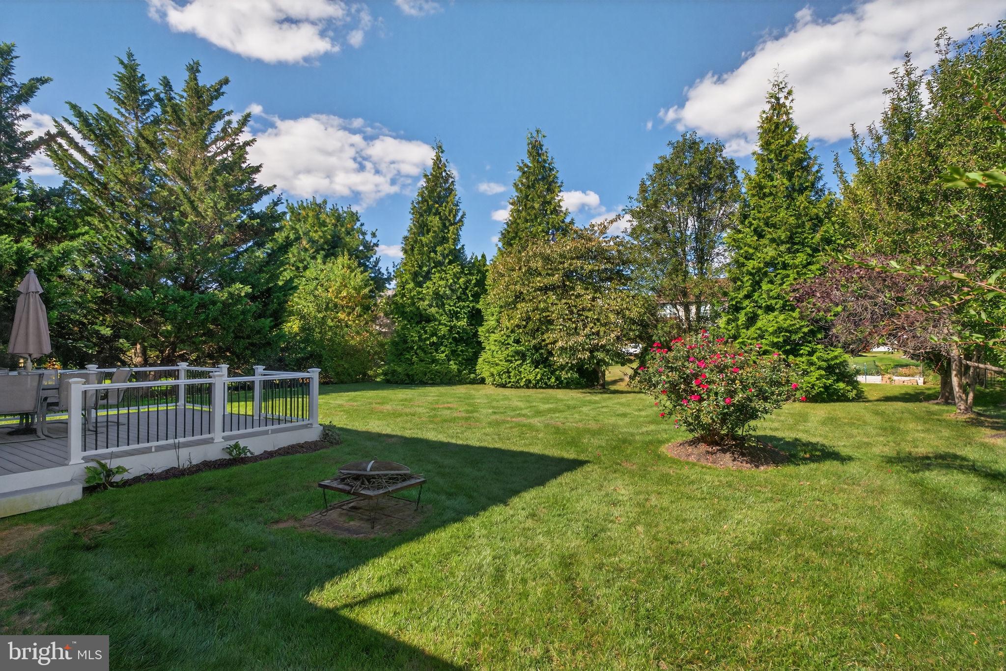 6779 Hickory Road Macungie, PA 18062 - Photo 11 of 51 a view of a backyard with a garden