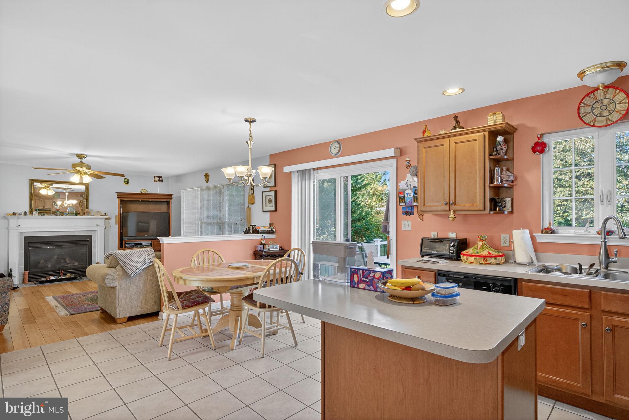 6779 Hickory Road Macungie, PA 18062 - Photo 18 of 51 a kitchen with a sink and a refrigerator