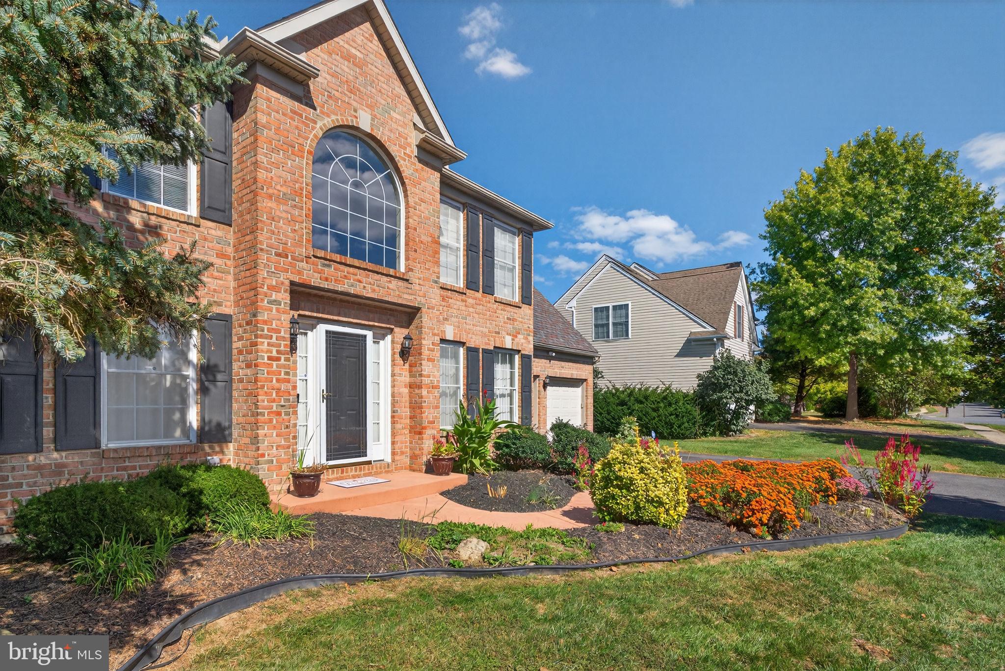 6779 Hickory Road Macungie, PA 18062 - Photo 2 of 51 a front view of a house with a yard