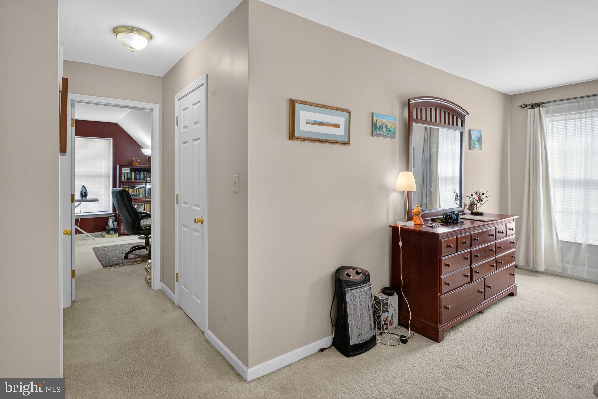 6779 Hickory Road Macungie, PA 18062 - Photo 23 of 51 a room with a bed and a mirror