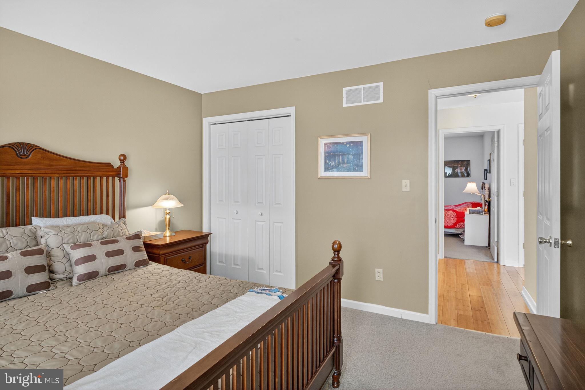 6779 Hickory Road Macungie, PA 18062 - Photo 25 of 51 a bedroom with furniture and a wooden floor