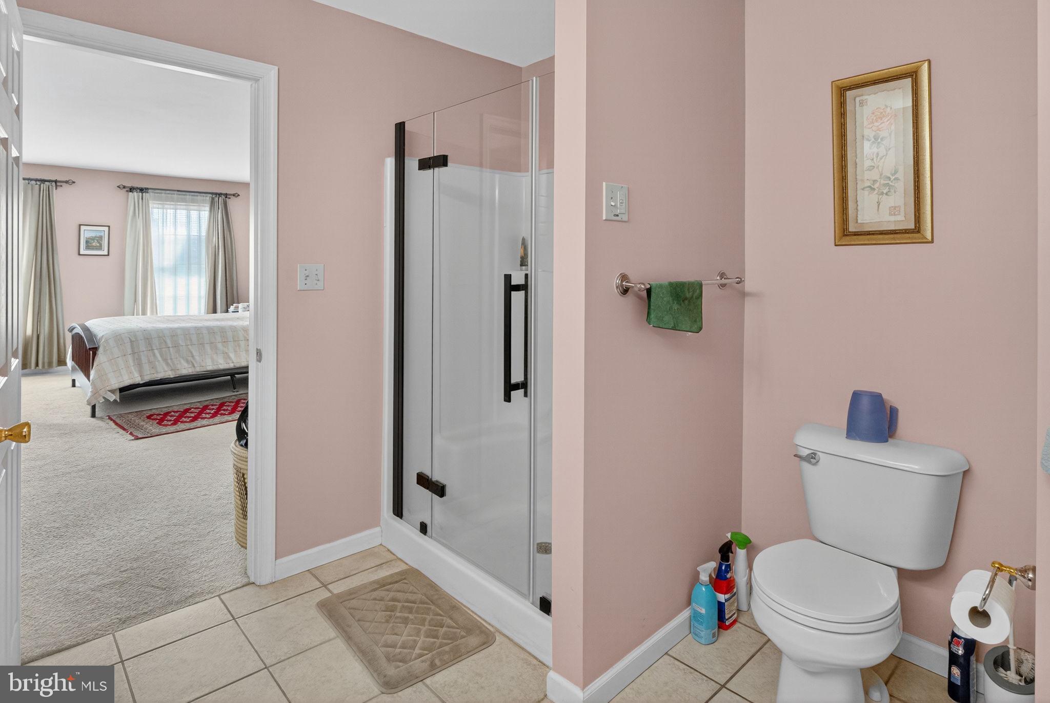 6779 Hickory Road Macungie, PA 18062 - Photo 29 of 51 a bathroom with a toilet and a shower