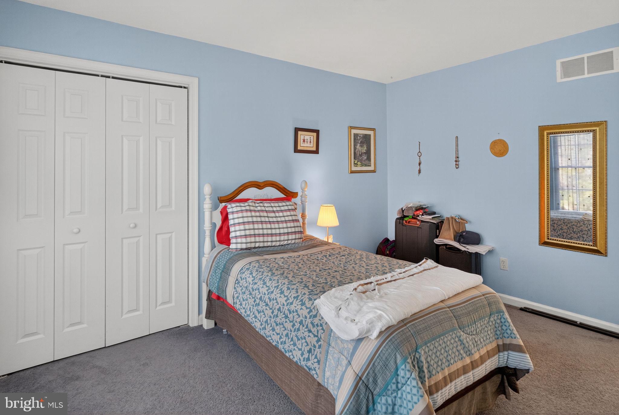 6779 Hickory Road Macungie, PA 18062 - Photo 34 of 51 a bedroom with a bed and a window