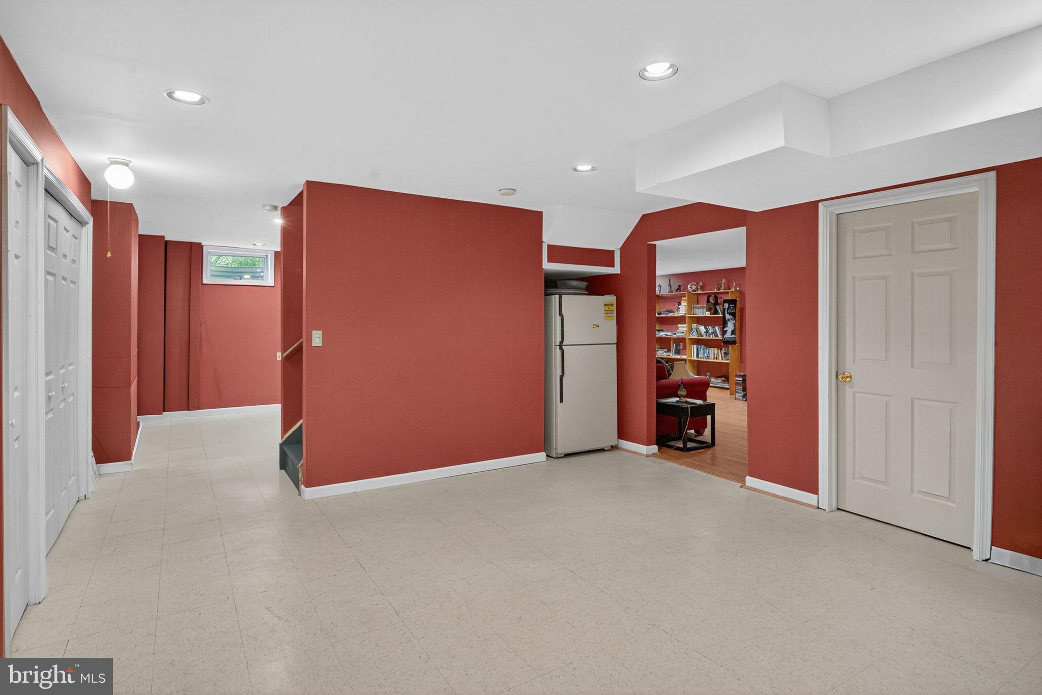 6779 Hickory Road Macungie, PA 18062 - Photo 45 of 51 a view of an empty room with furniture and a ceiling fan
