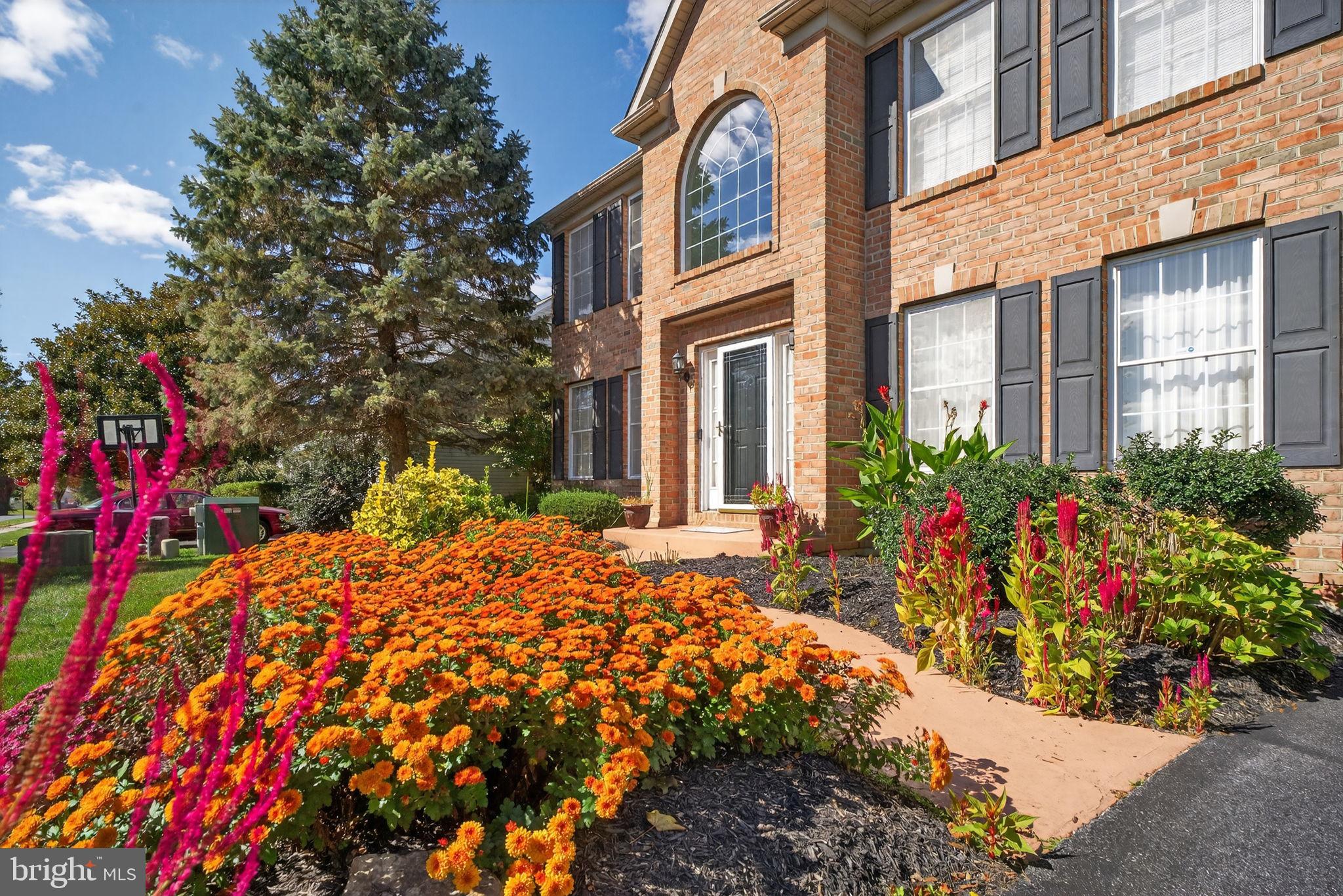 6779 Hickory Road Macungie, PA 18062 - Photo 6 of 51 a view of a house with a yard and pathway
