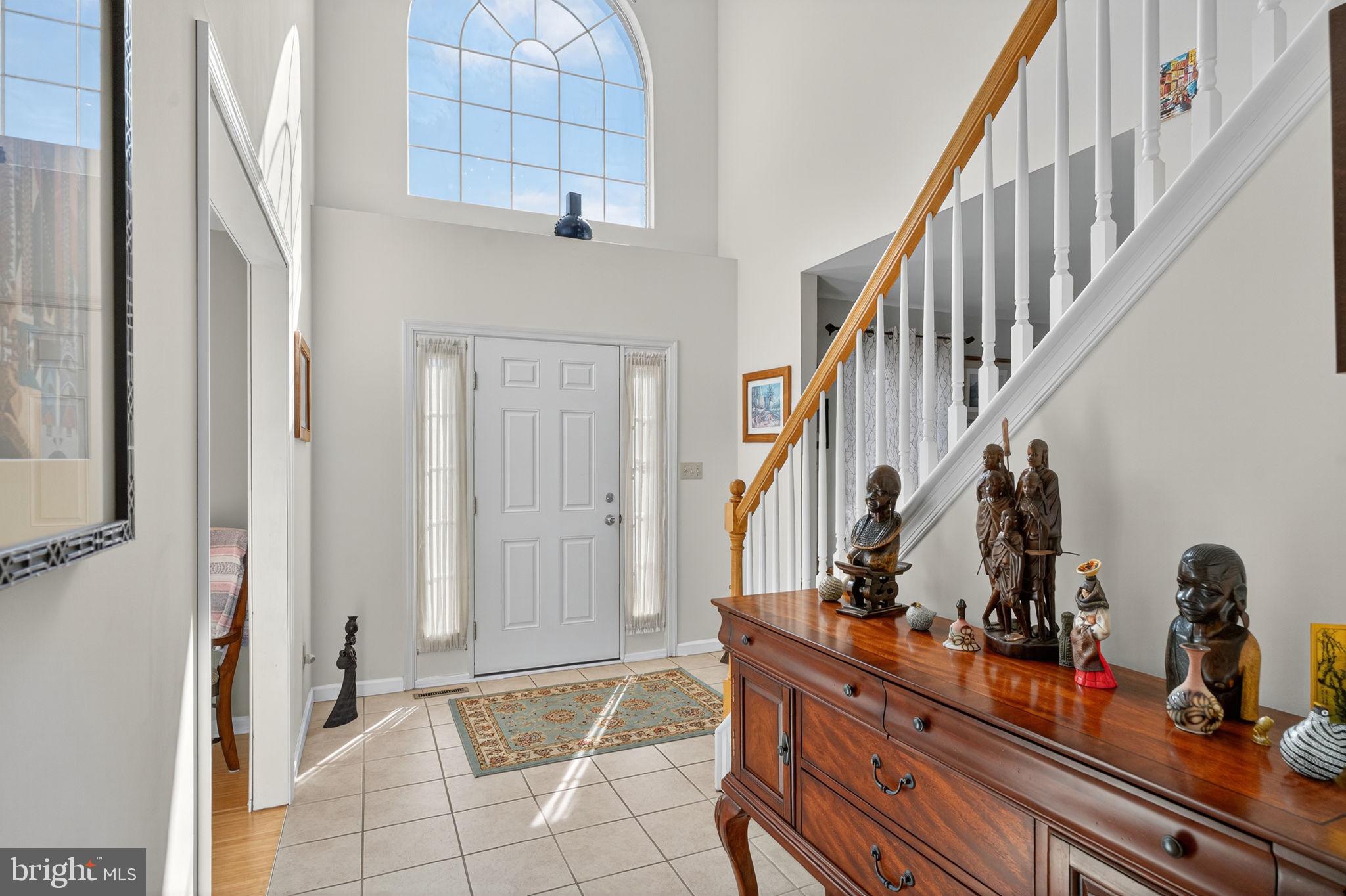 6779 Hickory Road Macungie, PA 18062 - Photo 7 of 51 a view of a hallway with closet and wooden floor