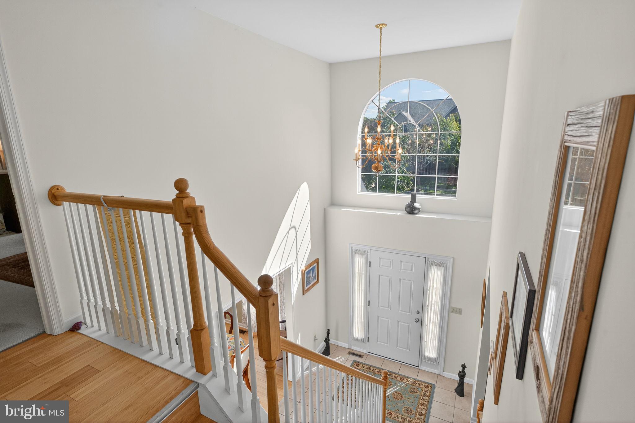 6779 Hickory Road Macungie, PA 18062 - Photo 9 of 51 a view of an entryway with wooden floor and windows