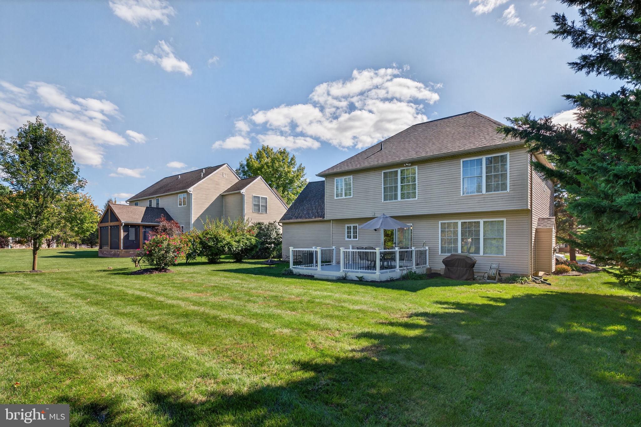 6779 Hickory Road Macungie, PA 18062 - Photo 10 of 51 a view of a house with a yard porch and sitting area