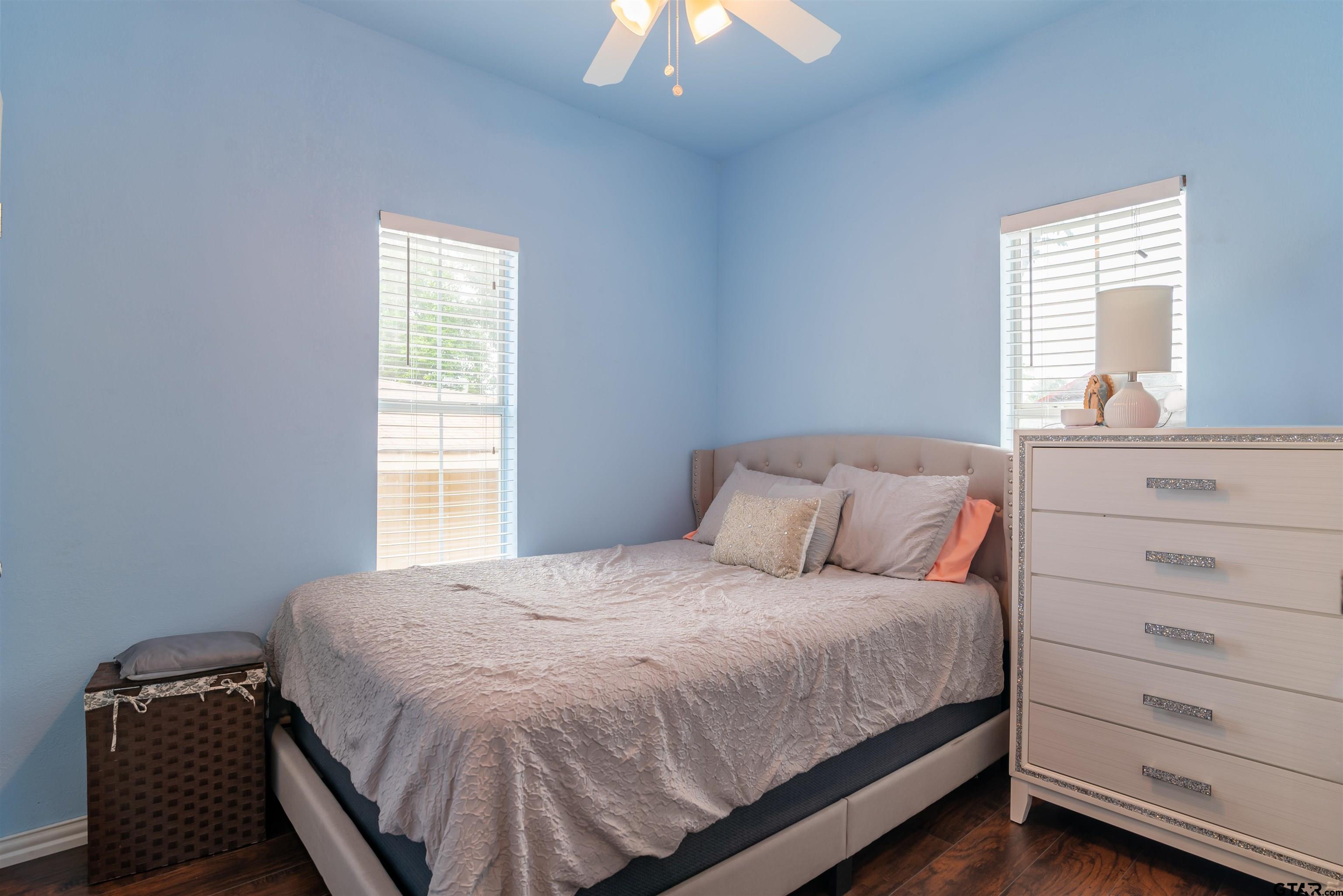427 East Locust Street Tyler, TX 75702 - Photo 20 of 42 a bedroom with a bed and a window
