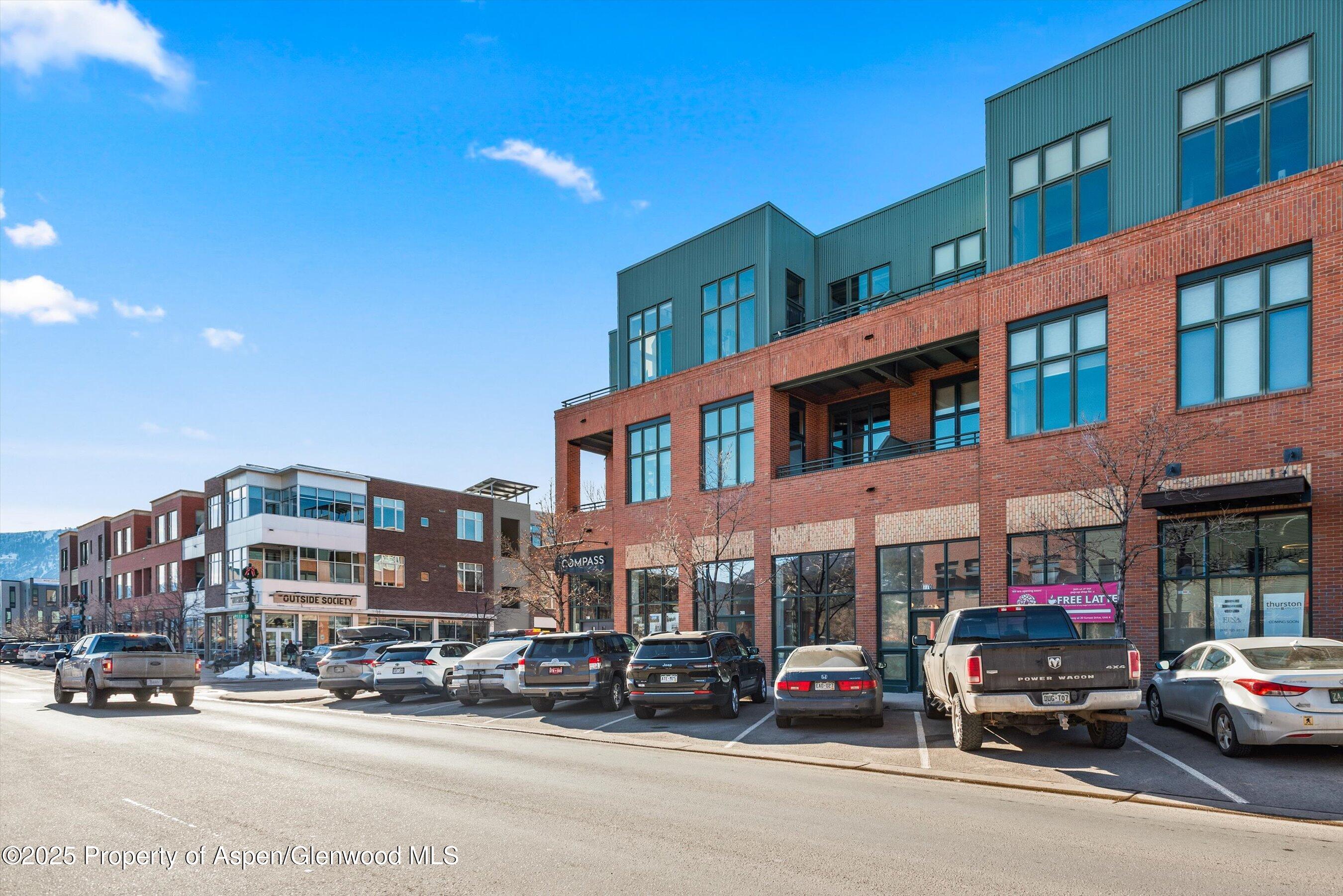 780 East Valley Road, Unit C126 Basalt, CO 81621 - Photo 2 of 9 a car parked in front of a building