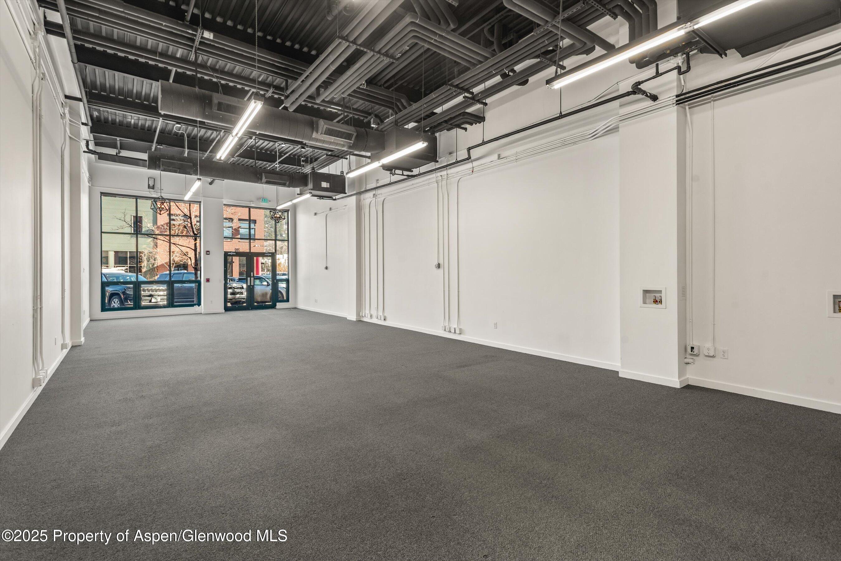 780 East Valley Road, Unit C126 Basalt, CO 81621 - Photo 4 of 9 a view of empty room with wooden walls
