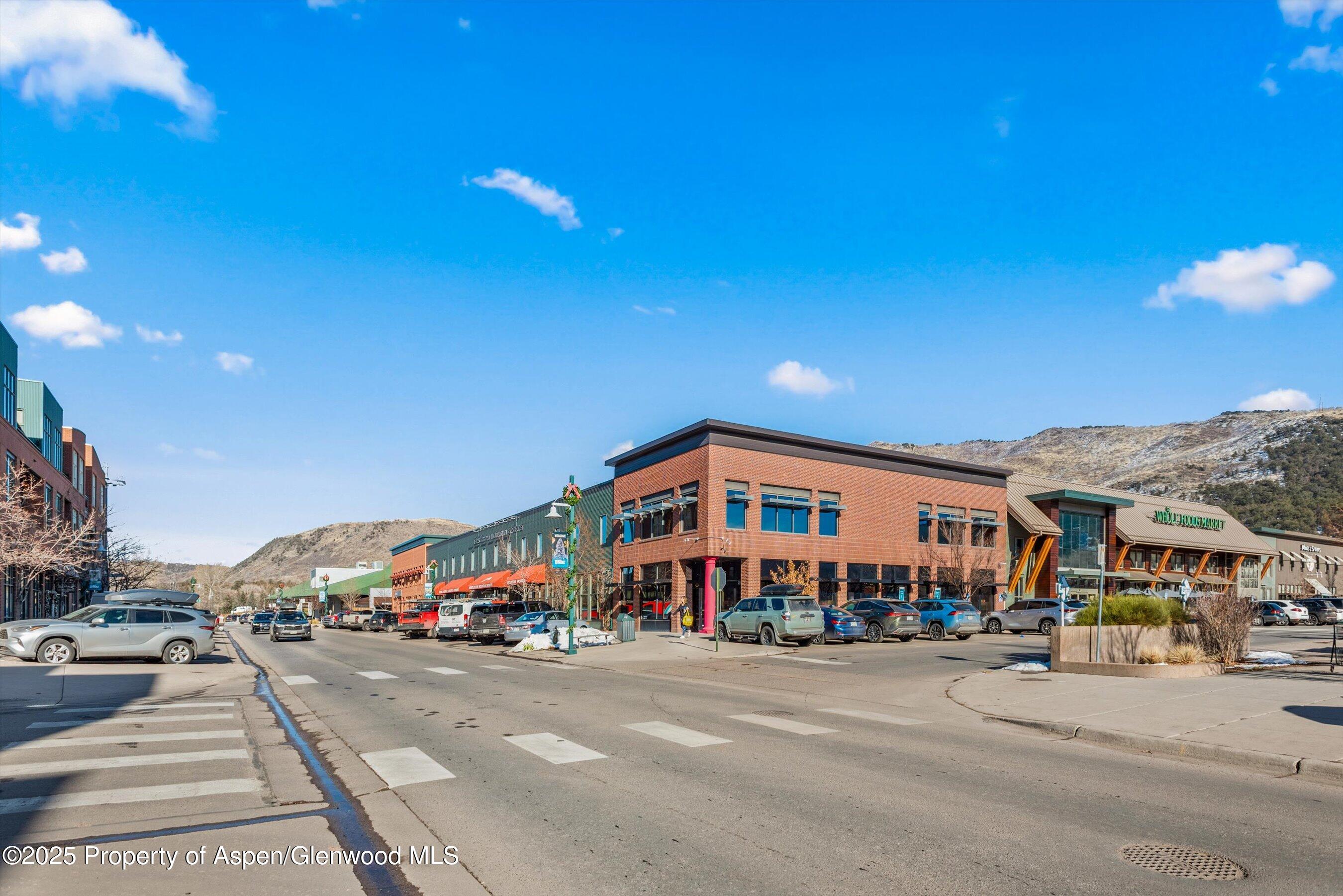 780 East Valley Road, Unit C126 Basalt, CO 81621 - Photo 9 of 9 a front view of a building with streets and trees