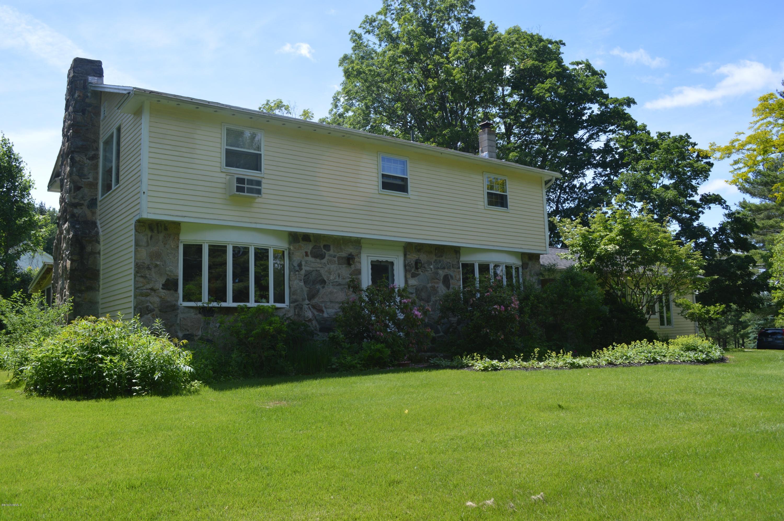 485 Devon Road Lee, MA 01238 - Photo 1 of 28 a front view of house with yard