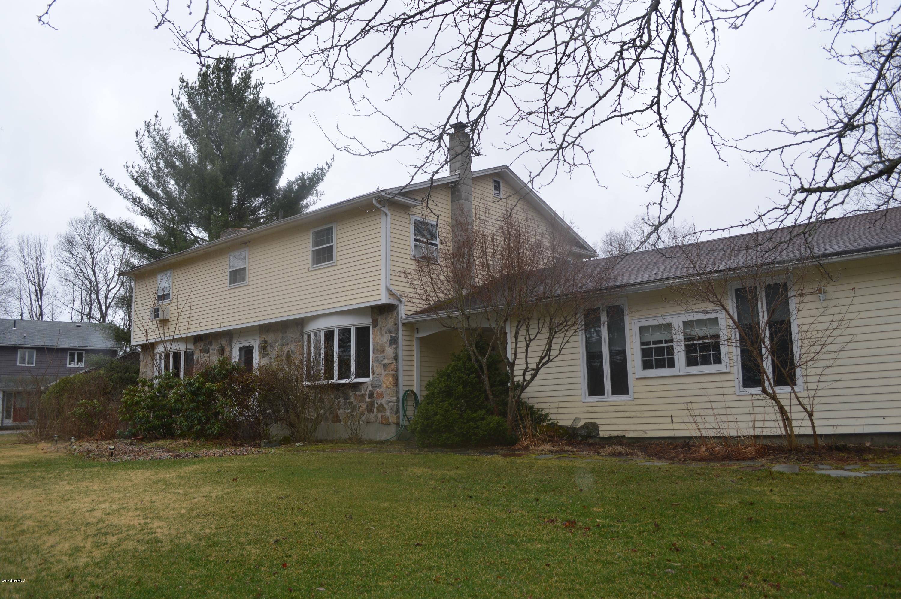 485 Devon Road Lee, MA 01238 - Photo 18 of 28 a house that has a tree in front of it