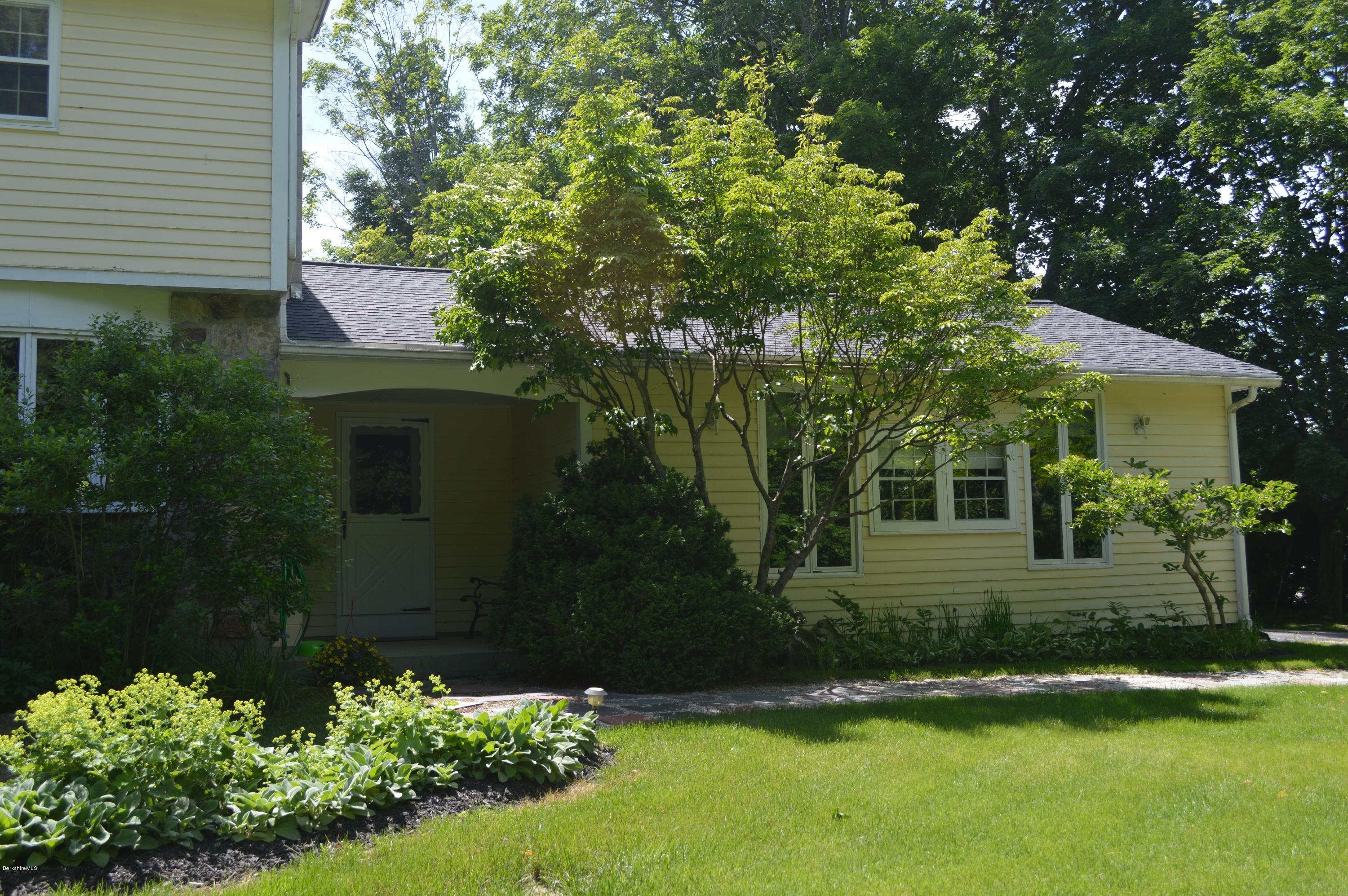 485 Devon Road Lee, MA 01238 - Photo 21 of 28 a view of a house with a yard