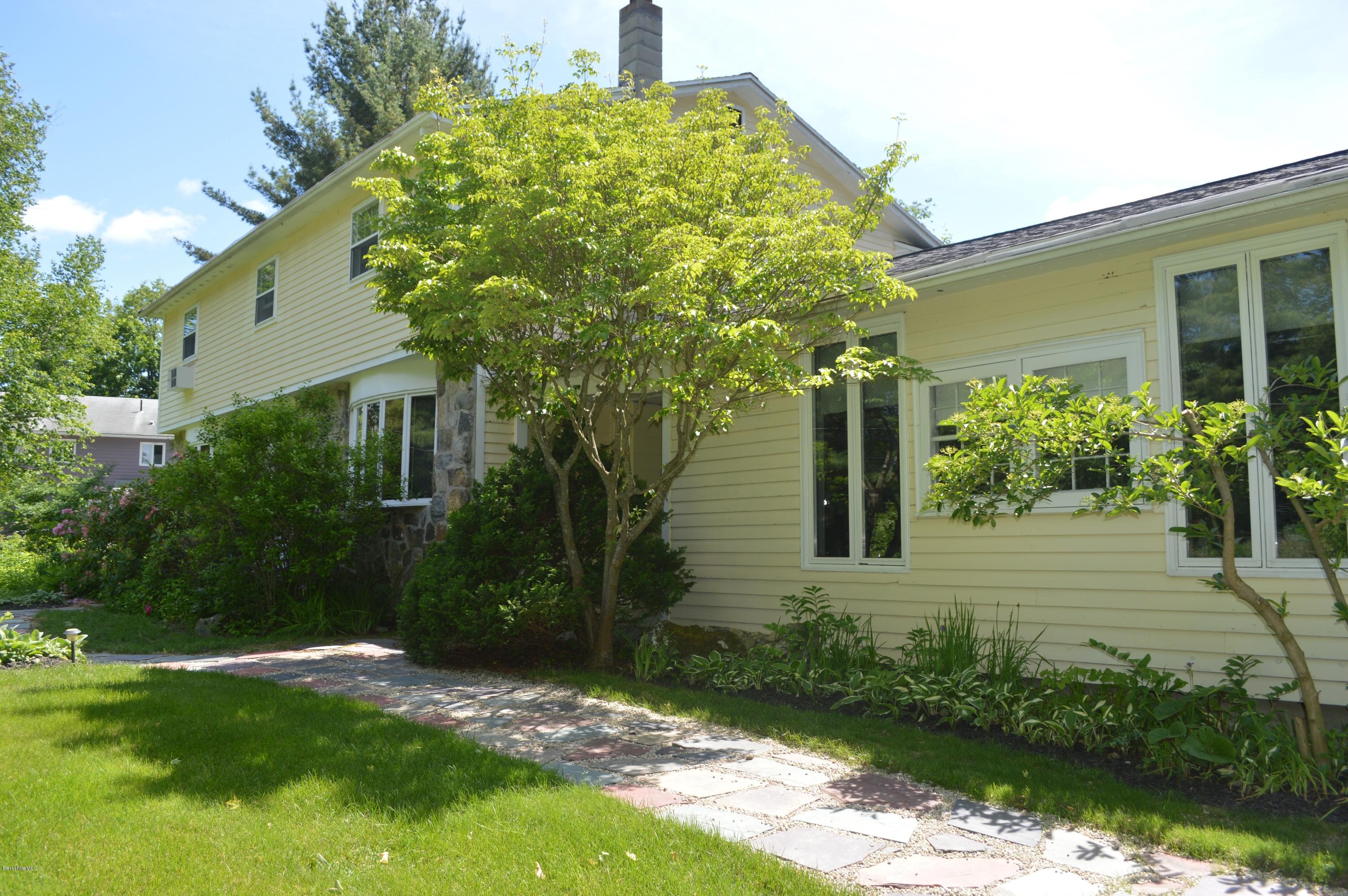 485 Devon Road Lee, MA 01238 - Photo 23 of 28 front view of a house with a yard