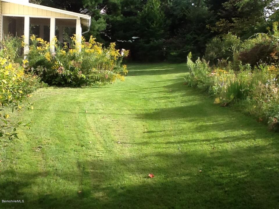 485 Devon Road Lee, MA 01238 - Photo 26 of 28 a view of a house with a yard