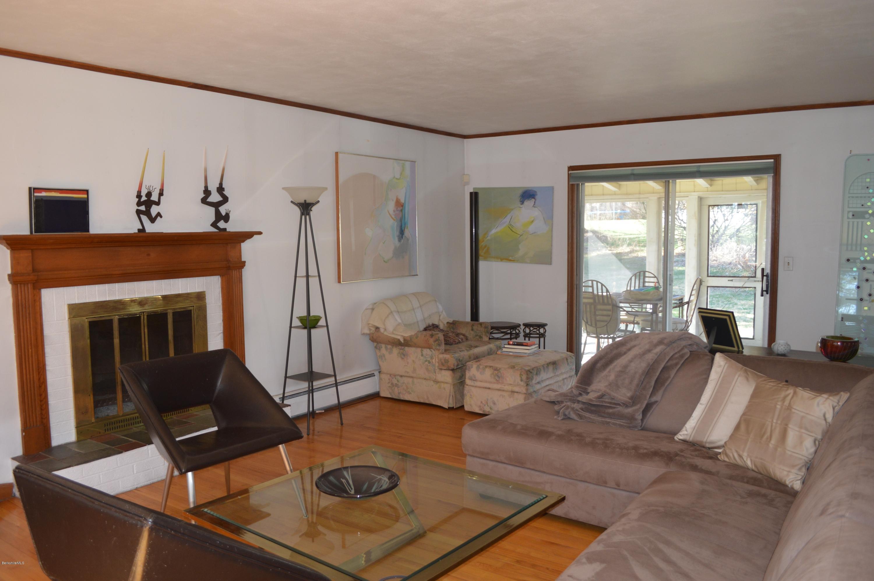 485 Devon Road Lee, MA 01238 - Photo 5 of 28 a living room with furniture and a fireplace
