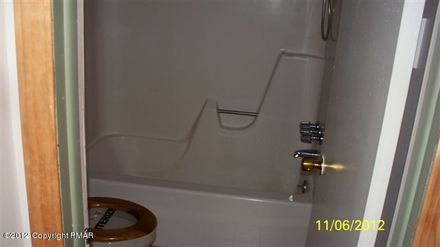 121 Rhododendron Lane Milford, PA 18337 - Photo 7 of 7 a bathroom with a shower