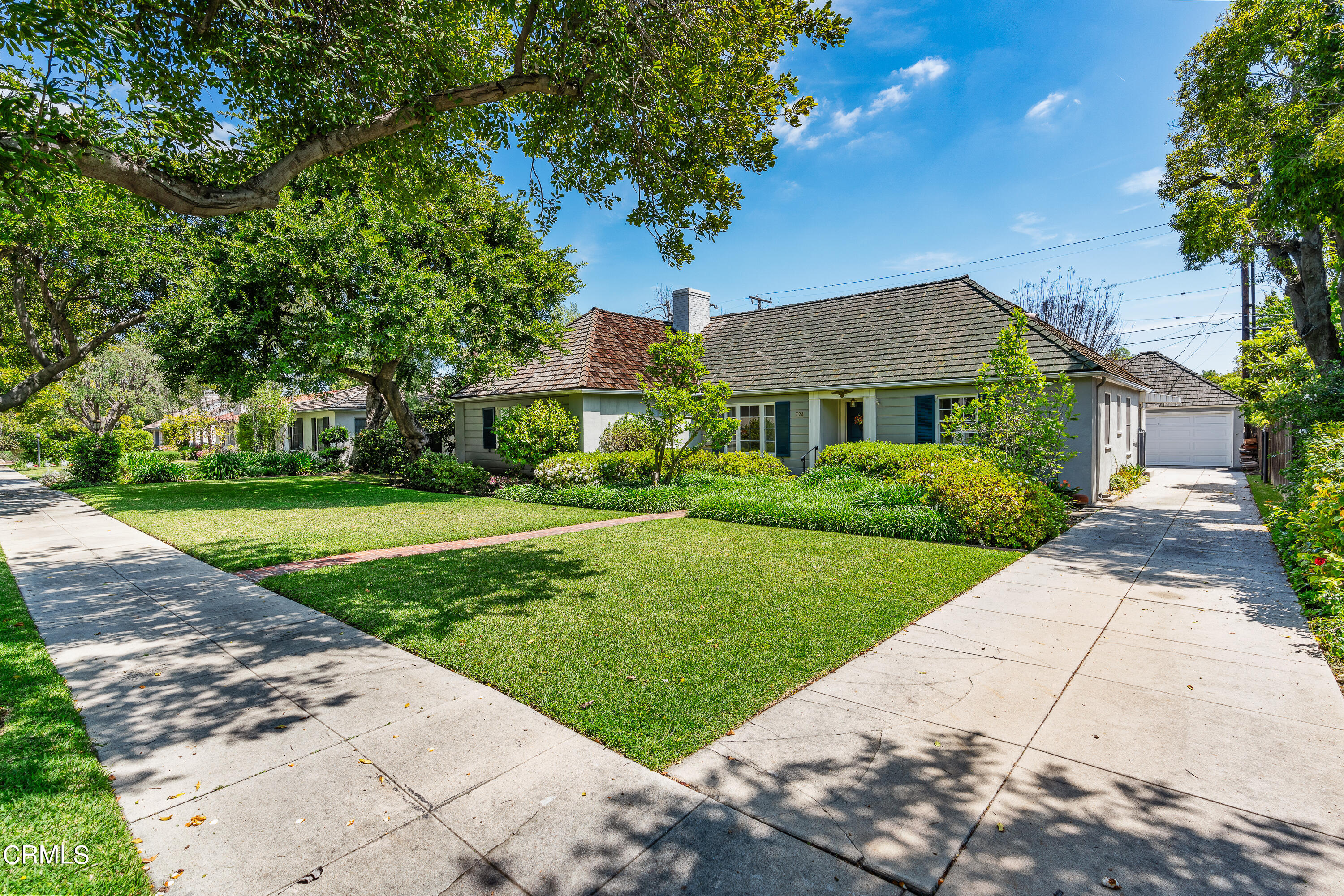 724 Winthrop Road San Marino, CA 91108 - Photo 2 of 37 a front view of a house with a yard