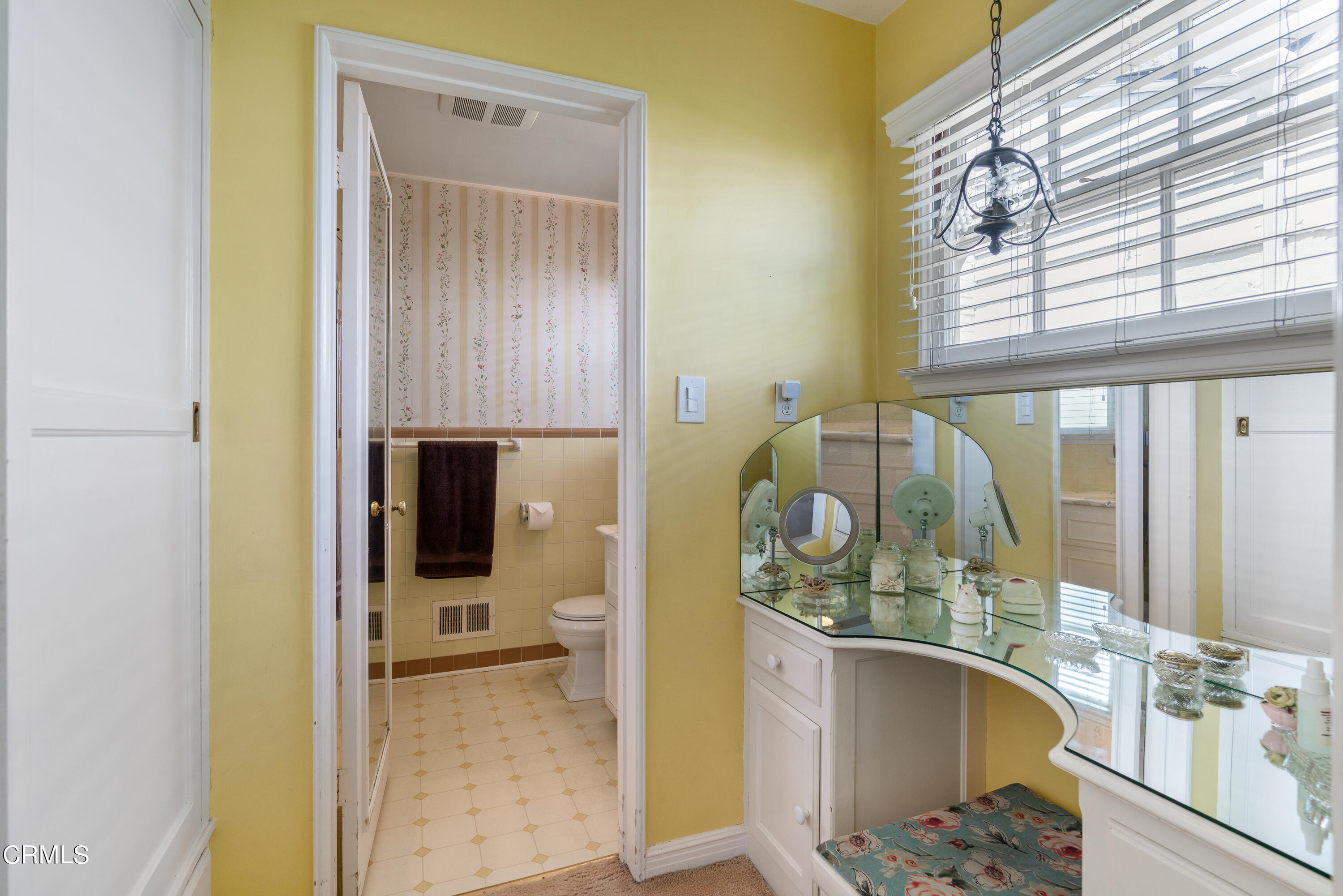 724 Winthrop Road San Marino, CA 91108 - Photo 22 of 37 a en suite bathroom with a granite countertop sink and a mirror