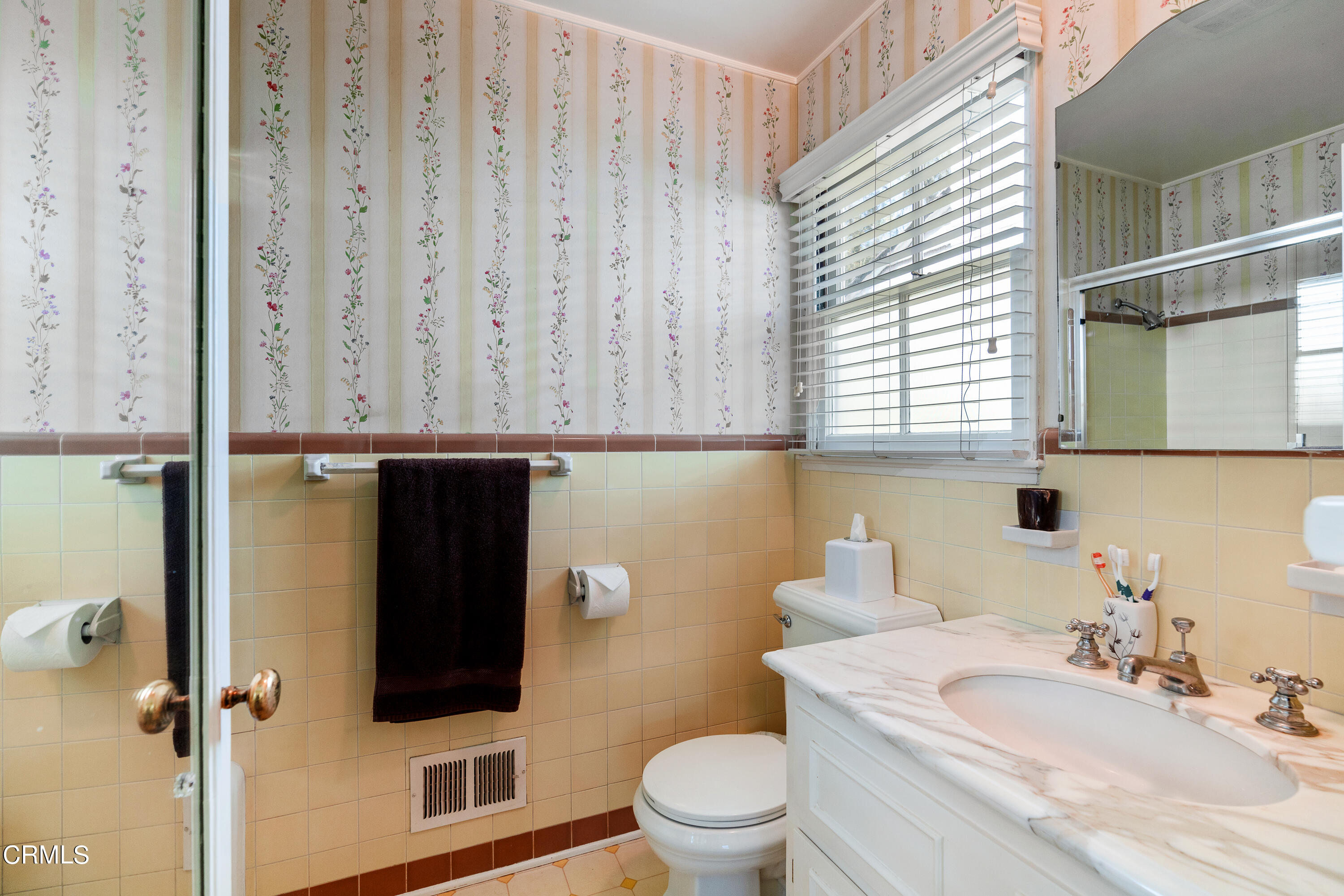 724 Winthrop Road San Marino, CA 91108 - Photo 23 of 37 a bathroom with a sink toilet and shower