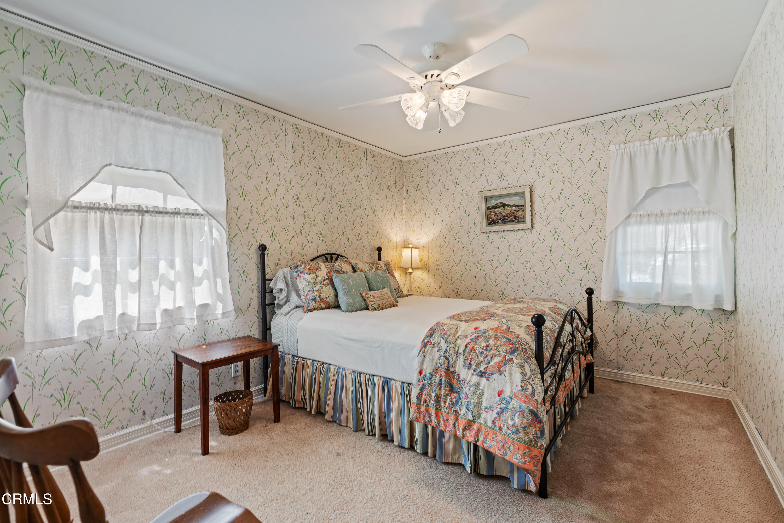 724 Winthrop Road San Marino, CA 91108 - Photo 24 of 37 a bedroom with a bed and a chandelier