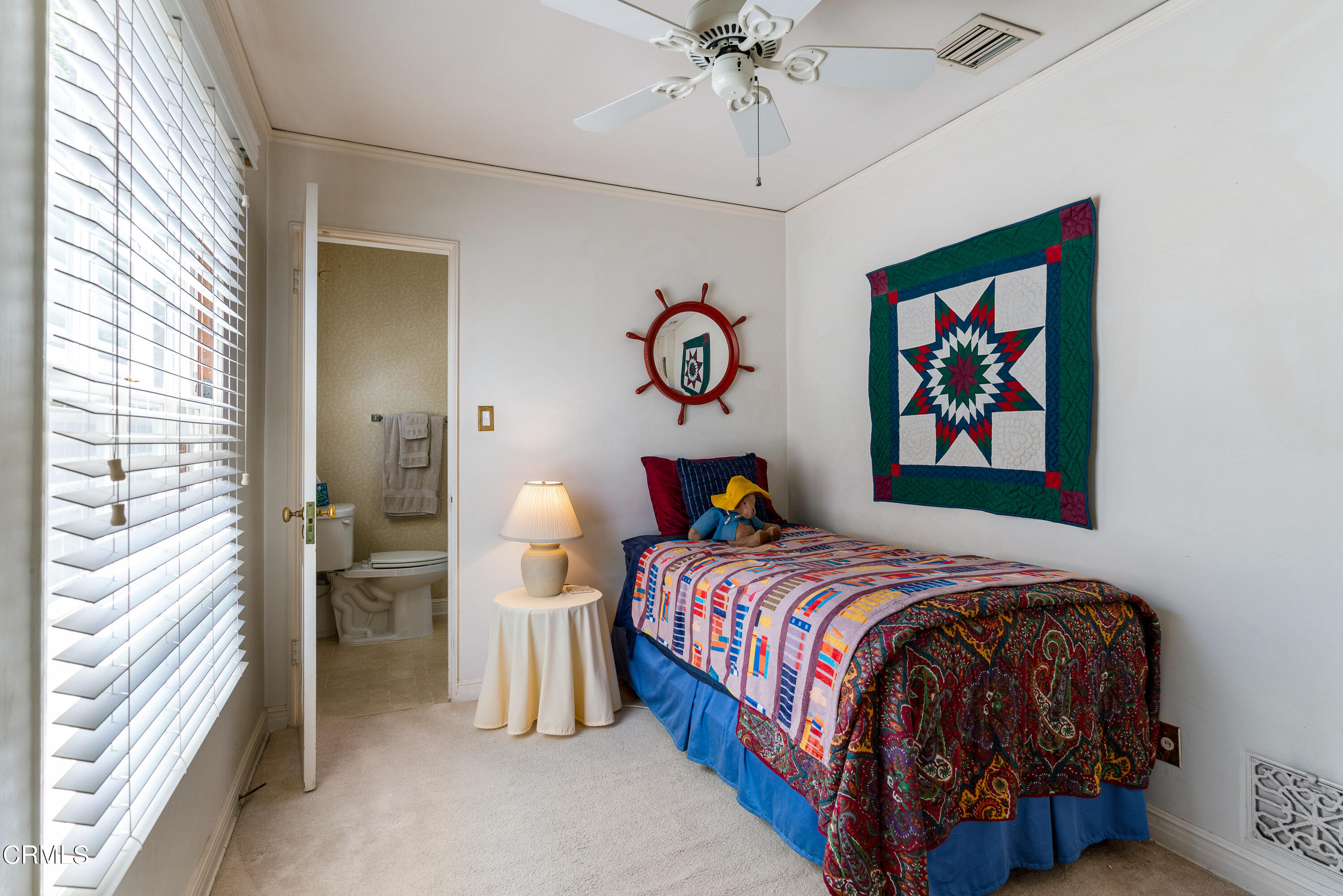 724 Winthrop Road San Marino, CA 91108 - Photo 28 of 37 a bedroom with bed and a chandelier