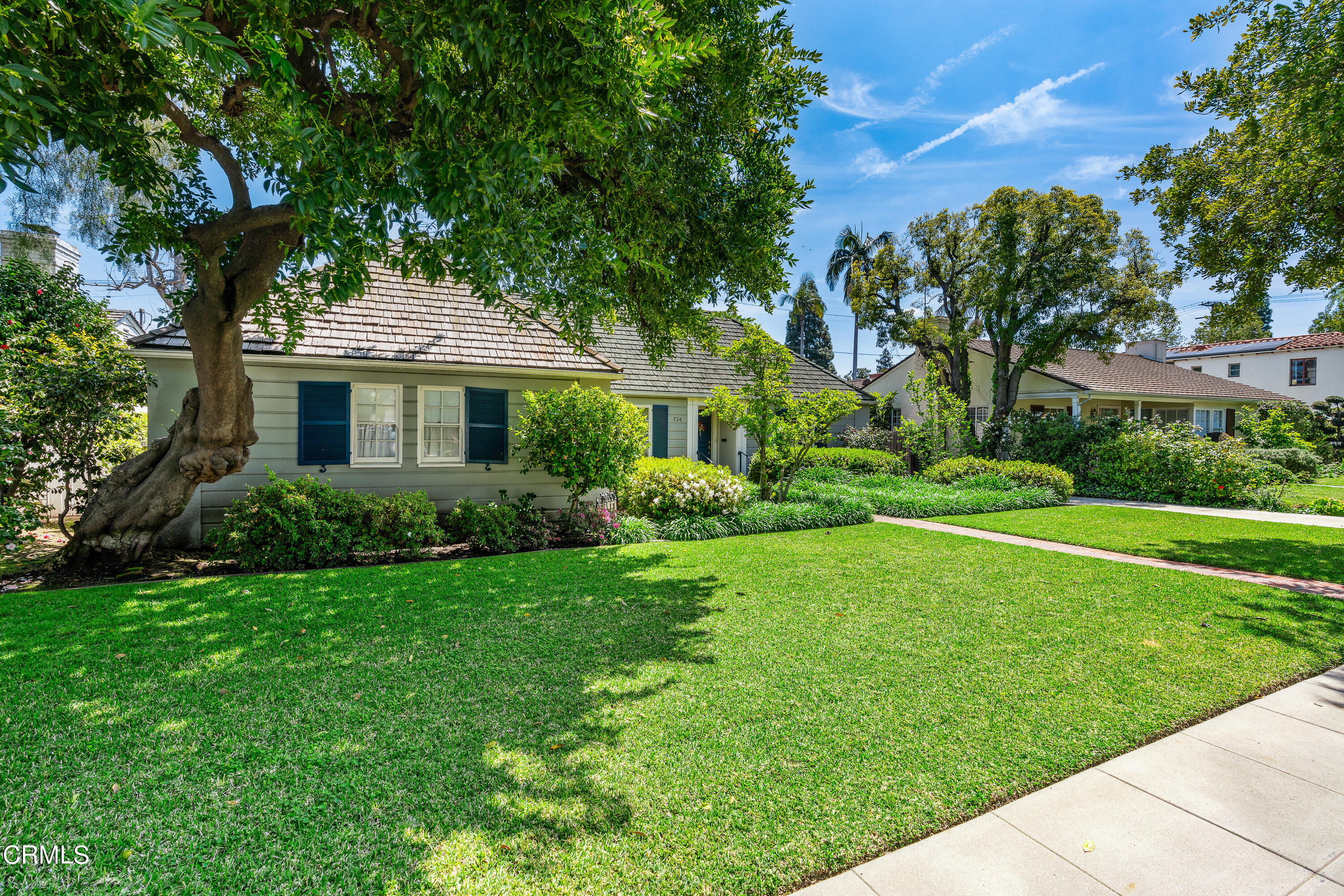 724 Winthrop Road San Marino, CA 91108 - Photo 3 of 37 a front view of a house with a yard
