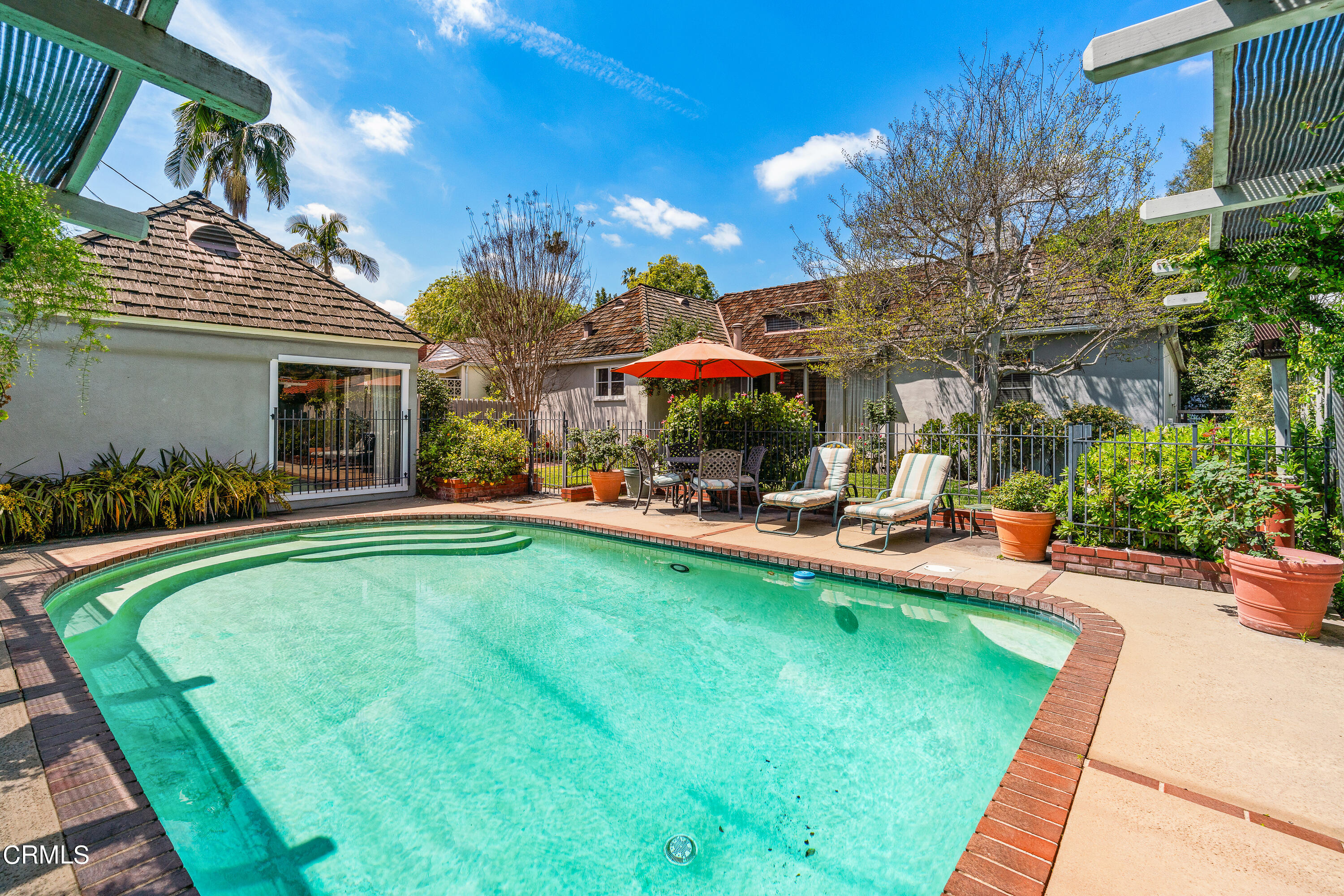 724 Winthrop Road San Marino, CA 91108 - Photo 34 of 37 a view of a house with swimming pool and sitting area